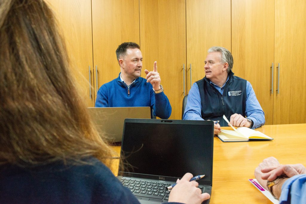 staff in the board room at Tennants Building and Construction